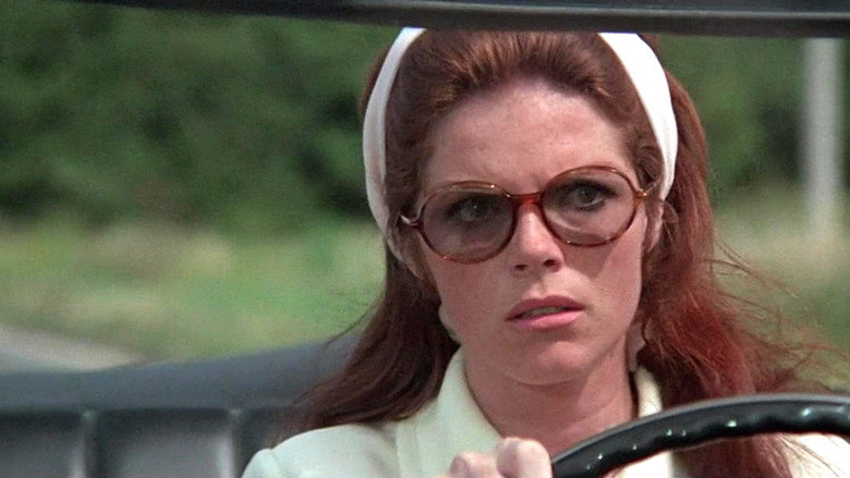 The Lady in the Car with Glasses and a Gun still 1